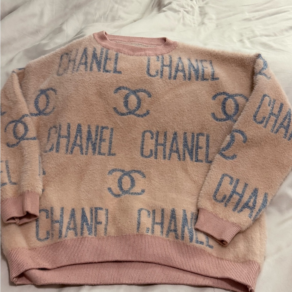 Chanel Soft Pink Sweater with Blue Logo Accents